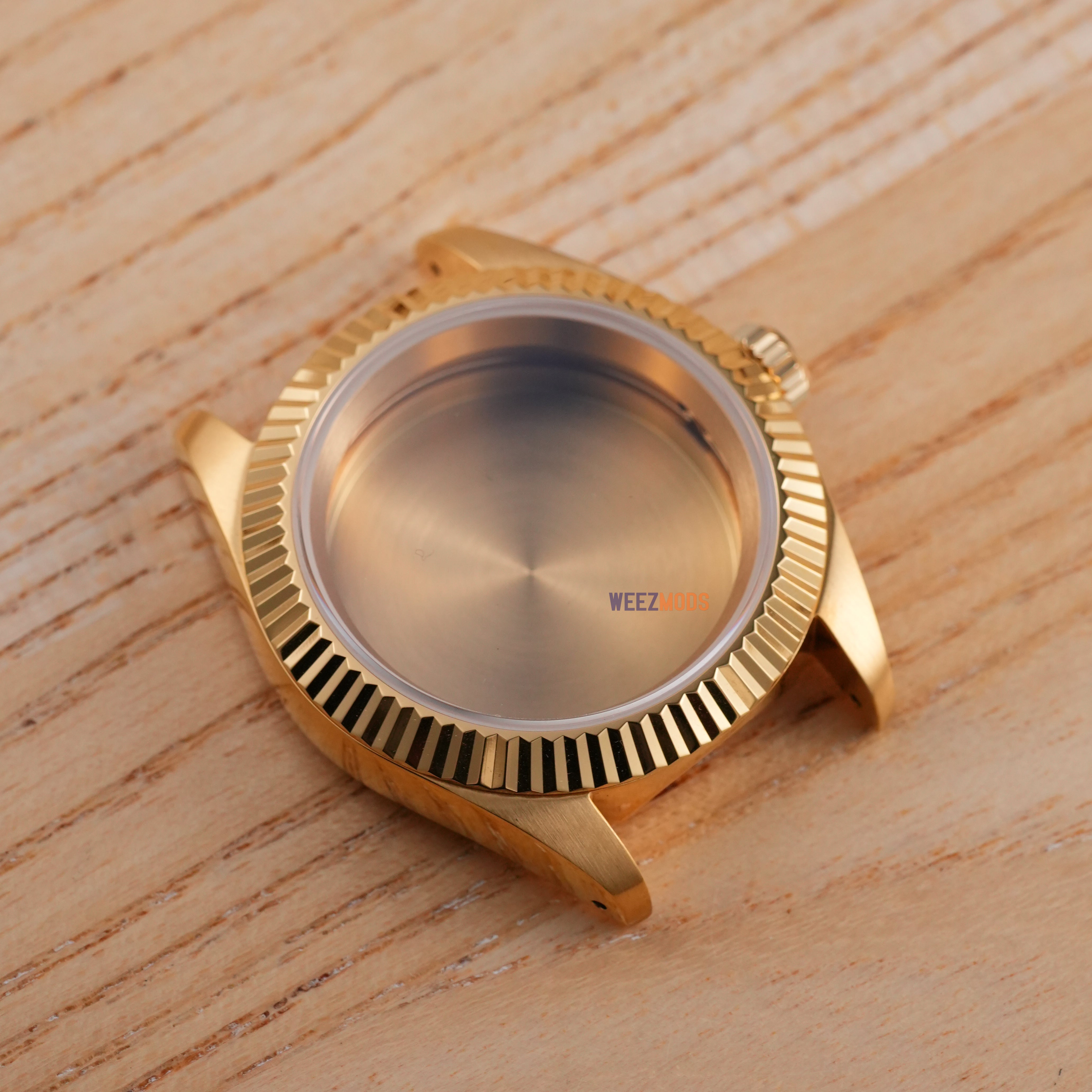40MM Fluted: Brushed Gold with Flat Sapphire Case