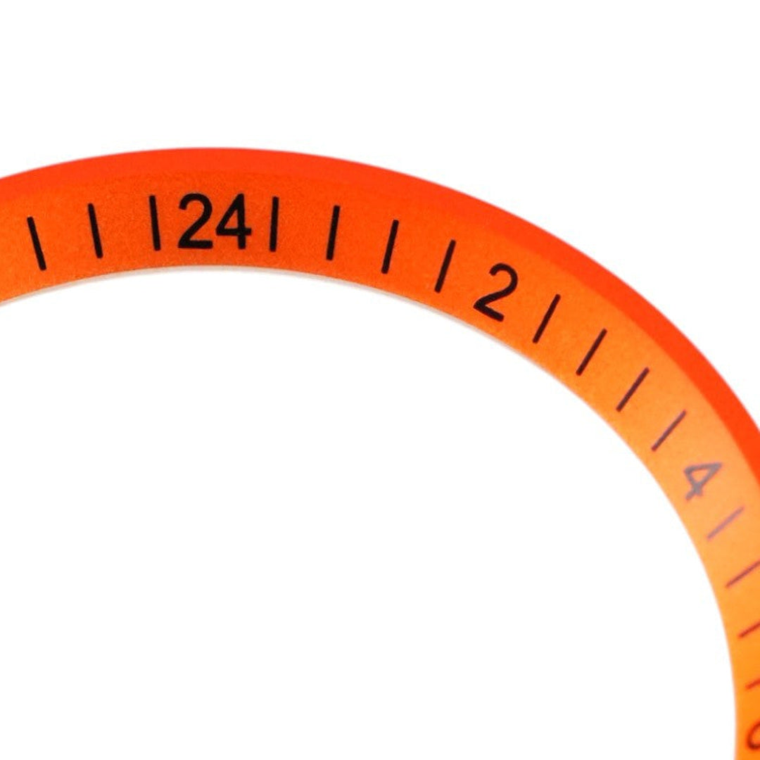 SRPE Chapter Ring GMT: Orange with Black Numerals — macro detail, close-up crop of the original product photograph