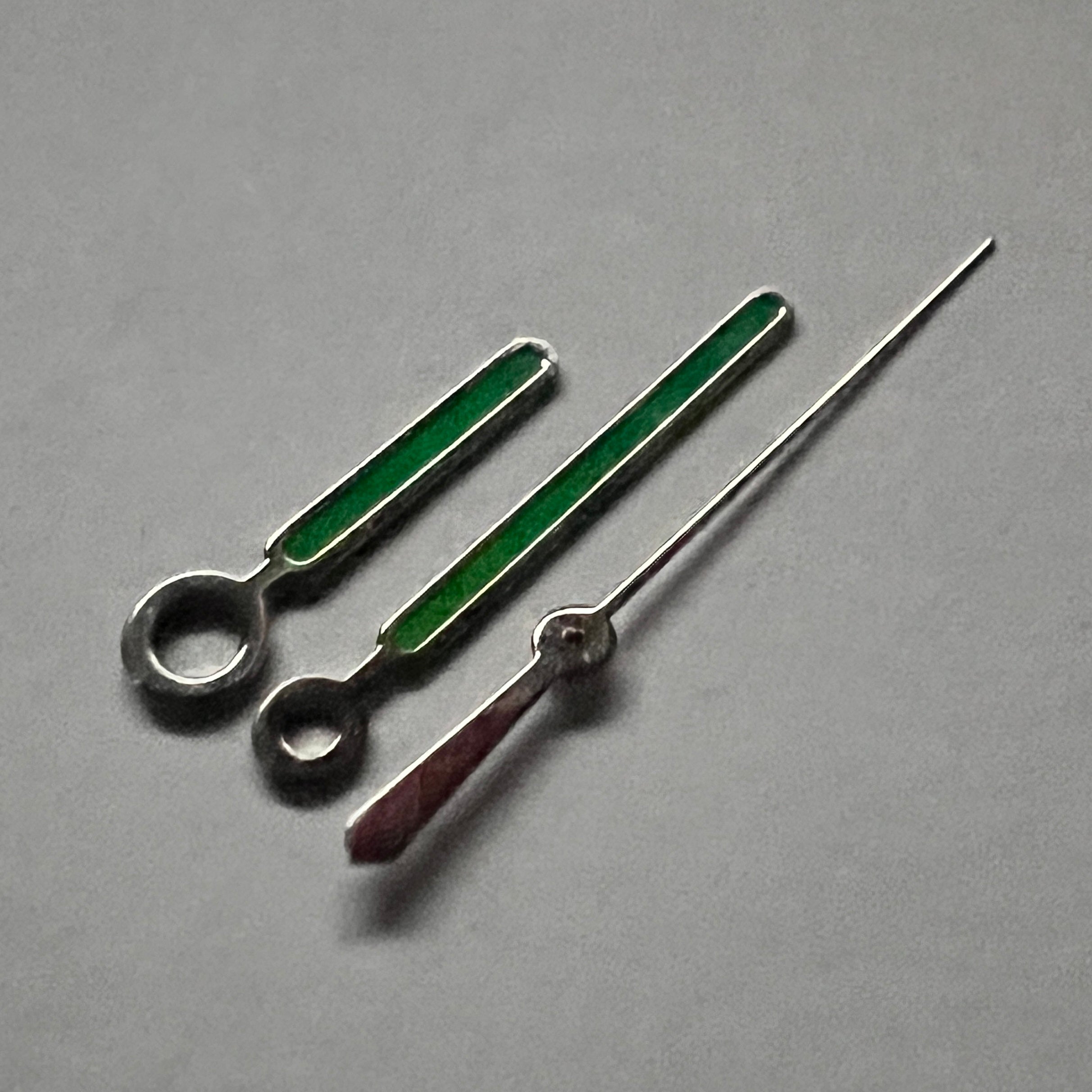 Nautilus: Polished Silver Hands in Black Lume