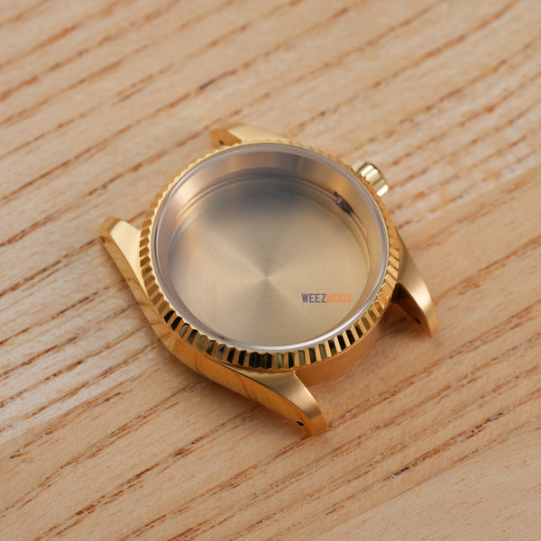 36MM Fluted: Brushed Gold with Flat Sapphire Case
