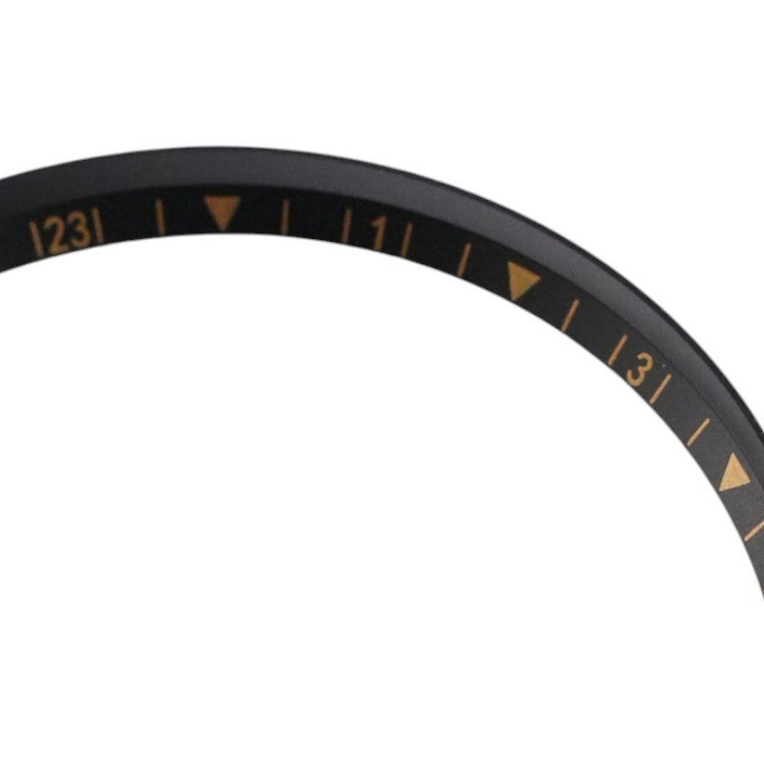 SKX007/SRPD Short GMT: Black with Gold Markers — macro detail, close-up crop of the original product photograph