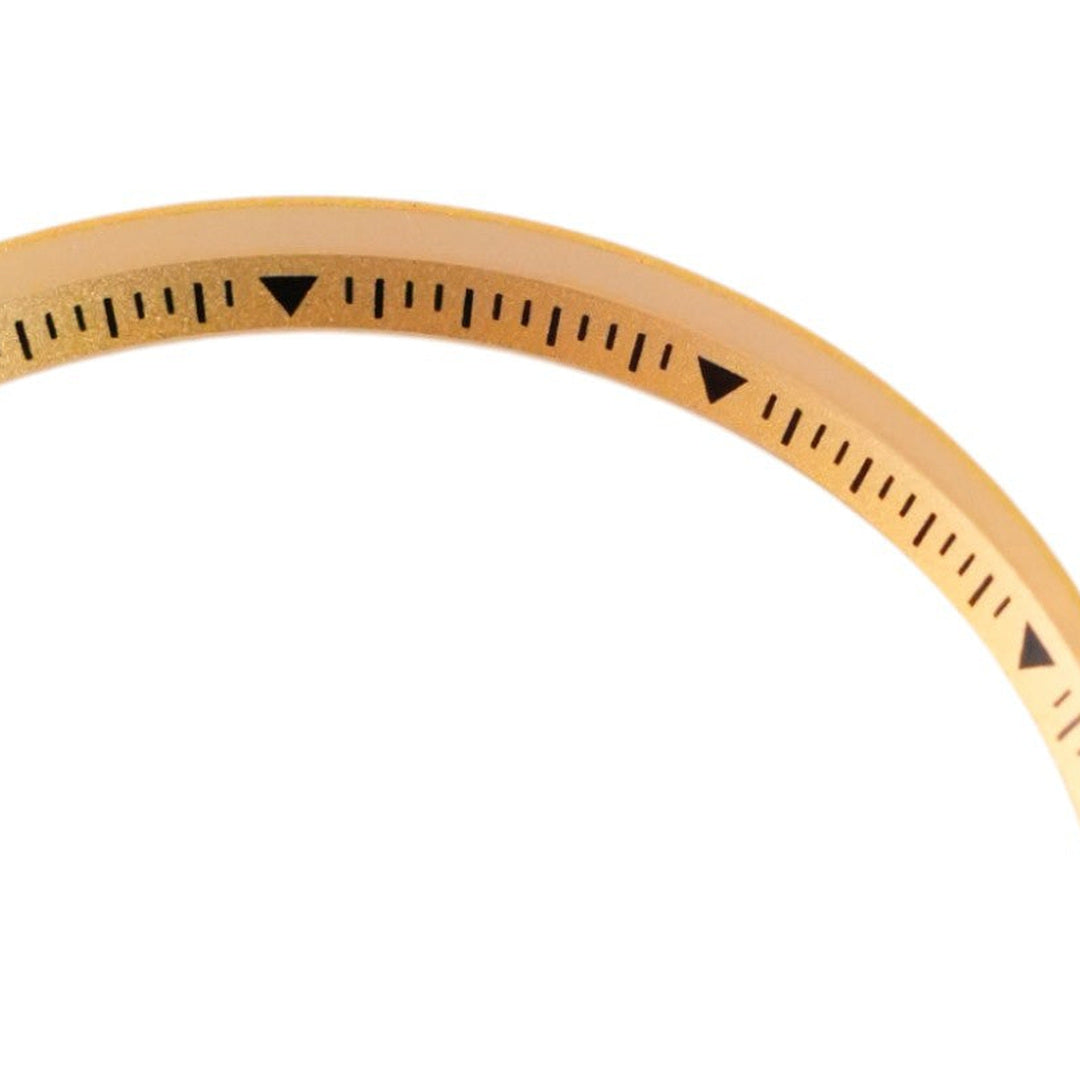 SKX007/SRPD Short Triangle: Gold with Black Markers — macro detail, close-up crop of the original product photograph