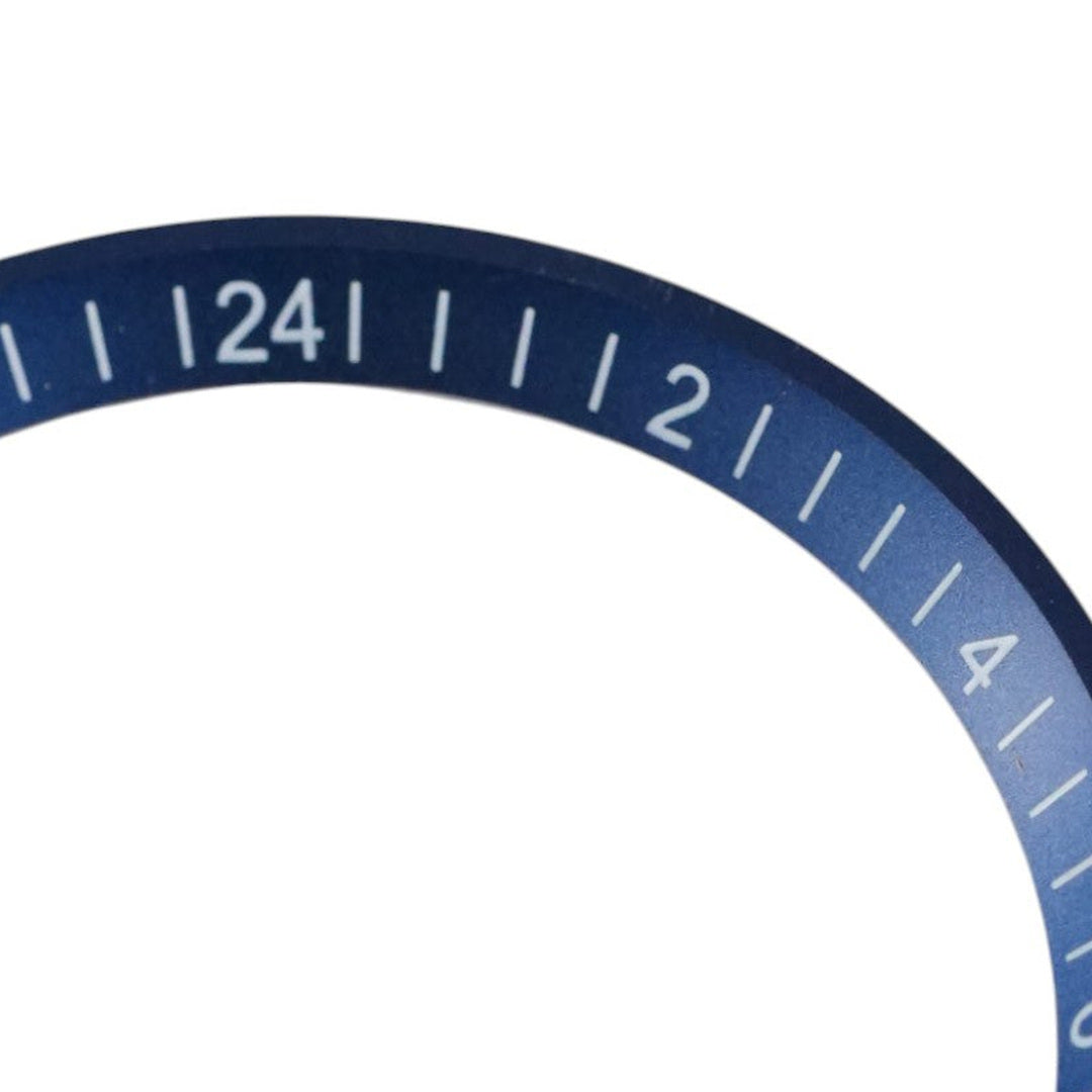 SRPE Chapter Ring GMT: Blue with White Numerals — macro detail, close-up crop of the original product photograph