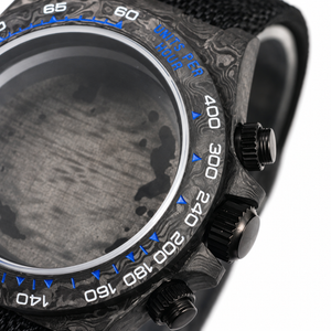 VK63 blue numeral black carbon case — crown and pushers macro